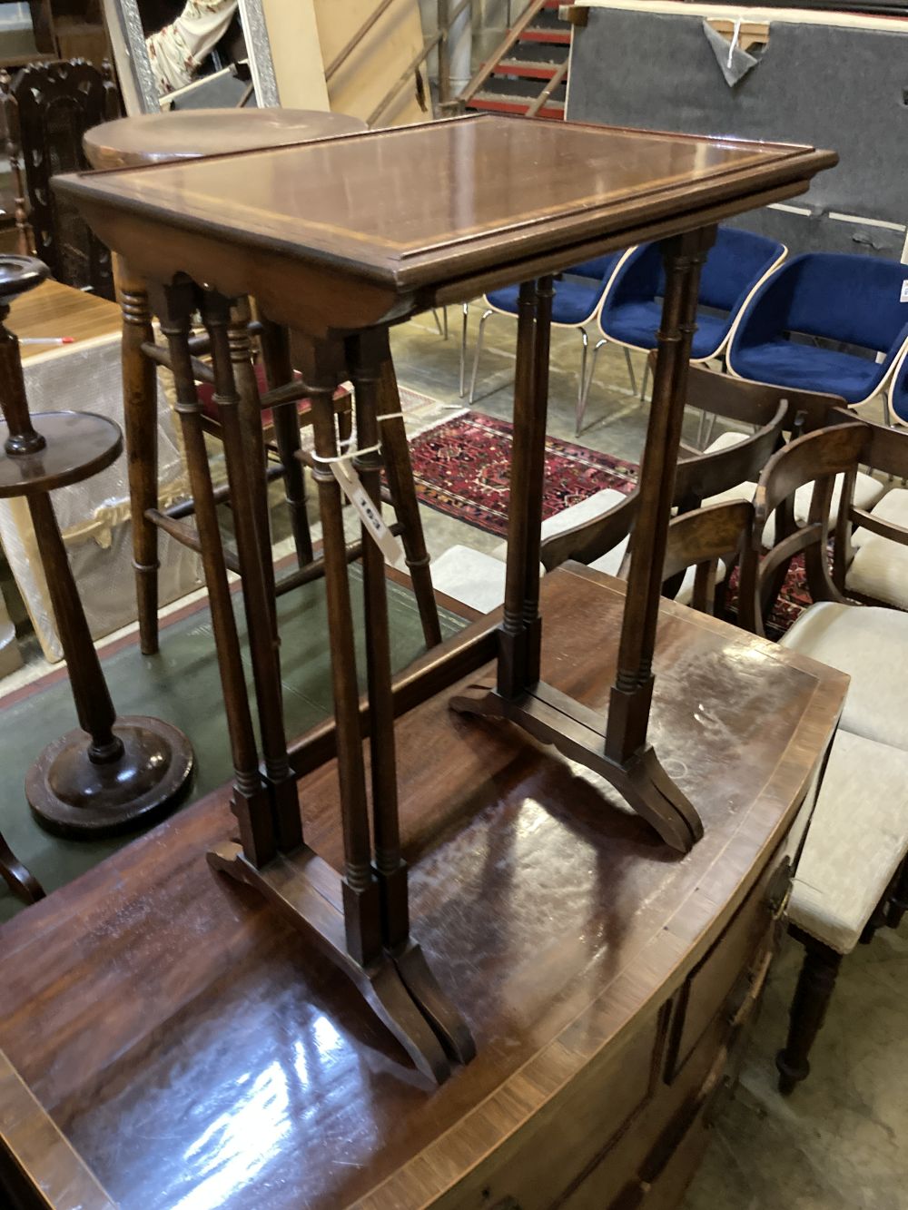 A nest of two Edwardian mahogany tea tables, width 42cm depth 34cm height 66cm